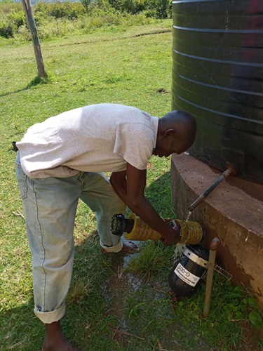 Cleaning-a-prefilter-at-the-Gona-Safe-Water-station-2022