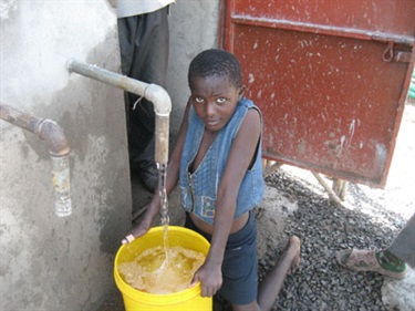Edina collecting her first bucket
