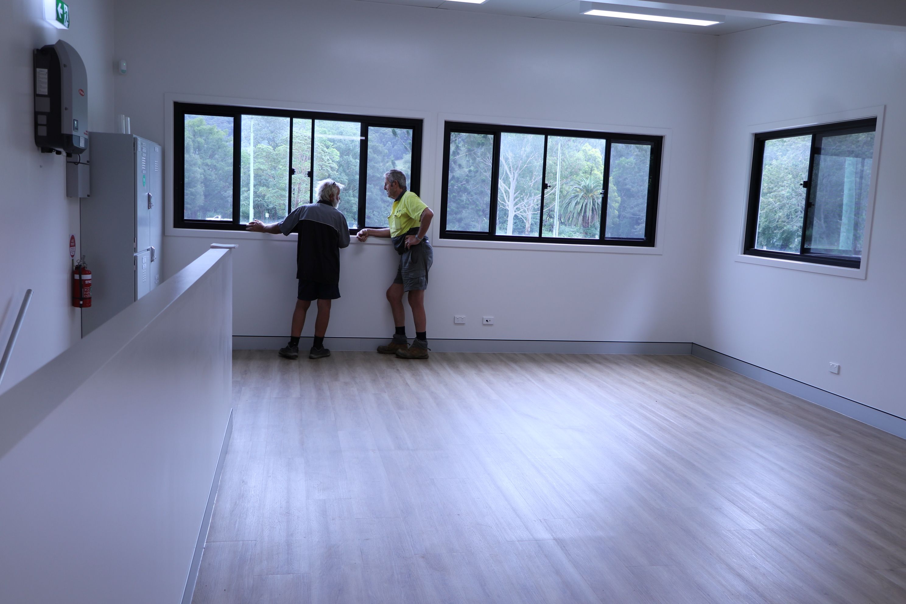 Committee members check out the new upstairs flood resilience room.