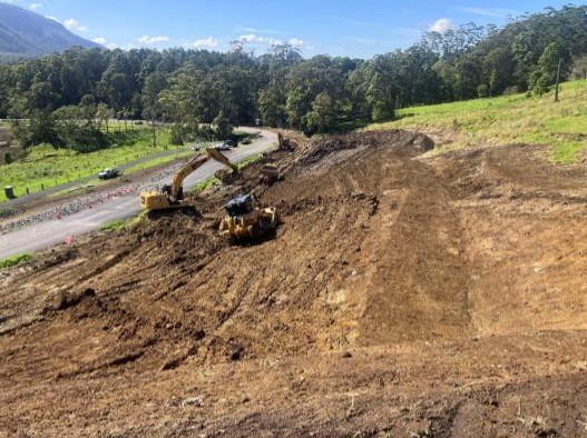 Restoration work has switched to the upslope side of Kyogle Road near Mount Burrell