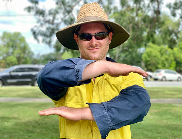 Man showing equality arm sign