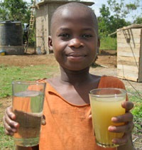 TKMP child holding water glasses