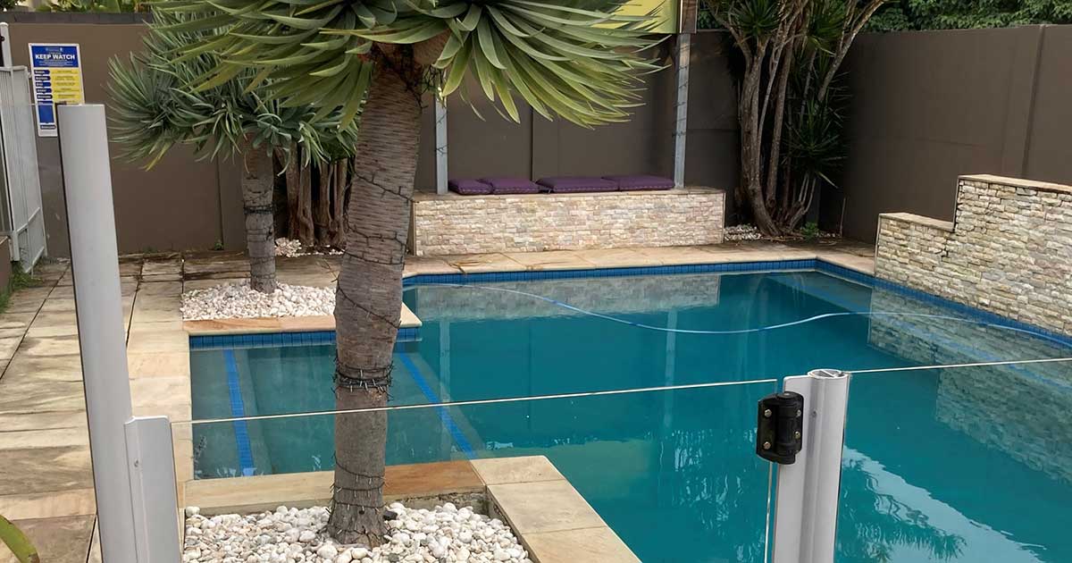 Backyard pool with fence