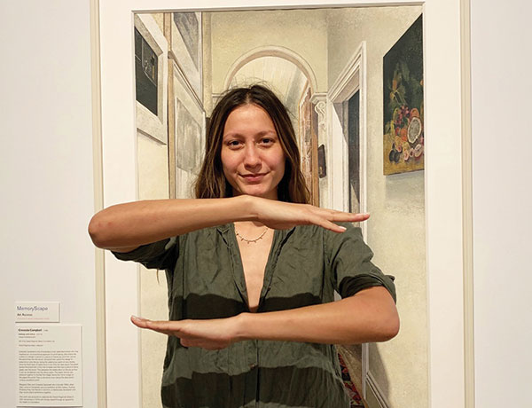 Woman showing equality arm sign
